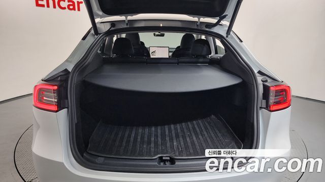 Tesla Model Y 2024 — photo 24