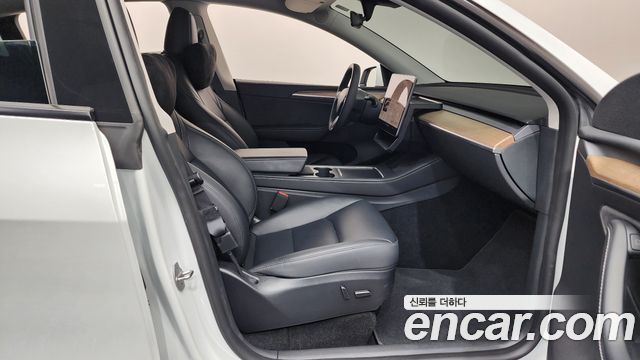 Tesla Model Y 2024 — photo 16