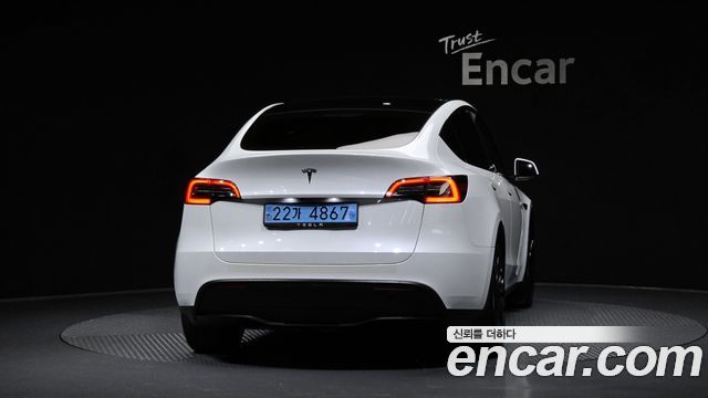 Tesla Model Y 2023 — photo 4