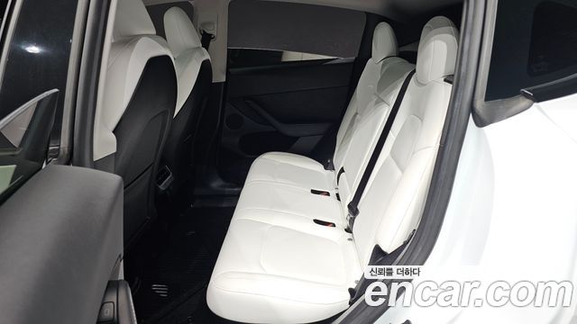 Tesla Model Y 2023 — photo 18