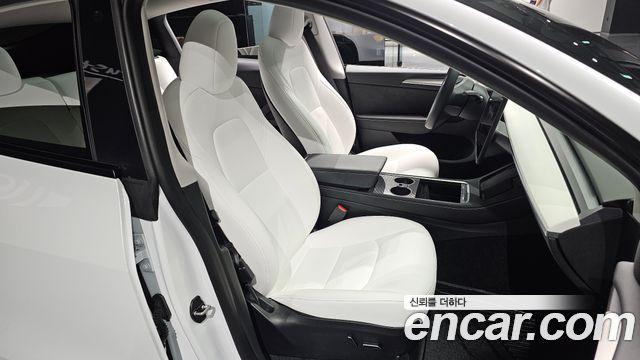 Tesla Model Y 2023 — photo 16