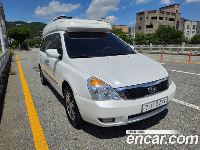 Kia Canival 2012 — photo 1