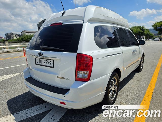 Kia Canival 2012 — photo 2