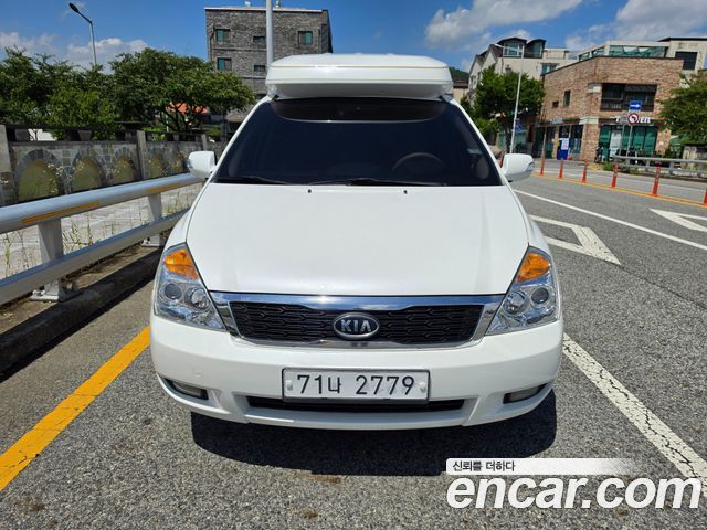 Kia Canival 2012 — photo 3