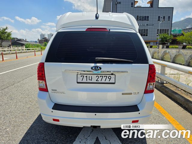 Kia Canival 2012 — photo 4