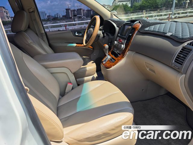 Kia Canival 2012 — photo 14