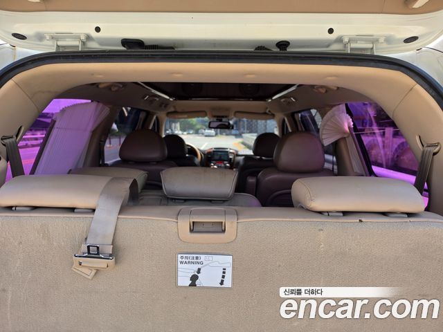 Kia Canival 2012 — photo 15