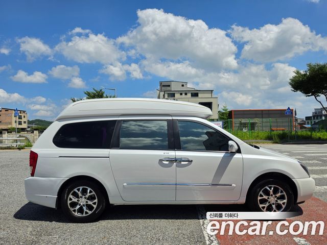 Kia Canival 2012 — photo 18