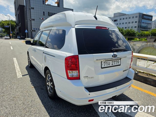 Kia Canival 2012 — photo 20