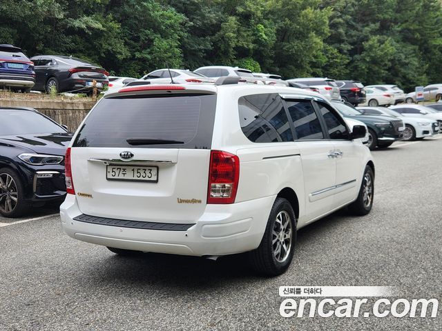Kia Canival 2014 — photo 2