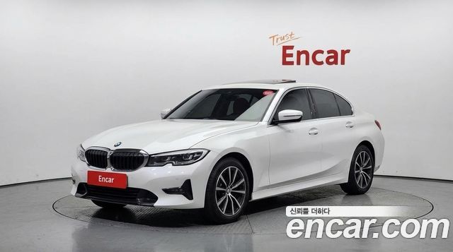BMW 3-Series 2021 — photo 1