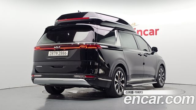 Kia Canival 2023 — photo 2