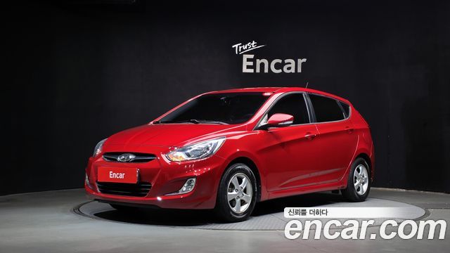 Hyundai Accent 2012 — photo 1