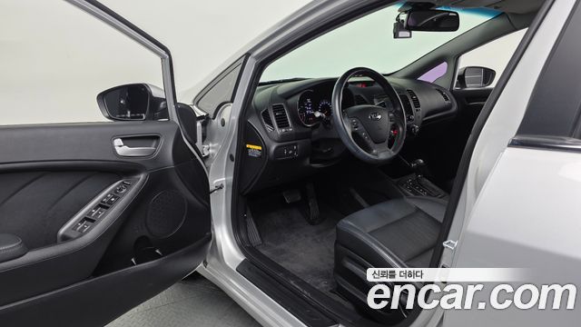 Kia K3 2013 — photo 13