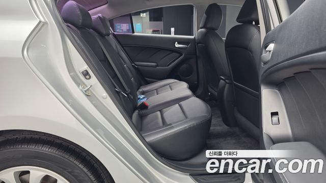 Kia K3 2013 — photo 18