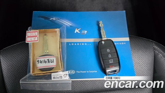 Kia K3 2013 — photo 25