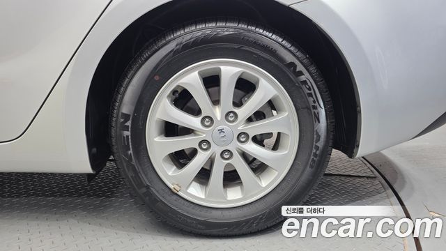 Kia K3 2013 — photo 7