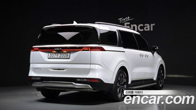 Kia Canival 2023 — photo 2