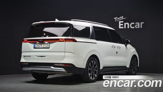 Kia Canival 2021 — photo 2