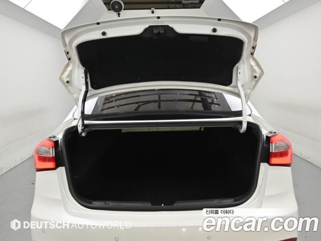 Kia K3 2013 — photo 19