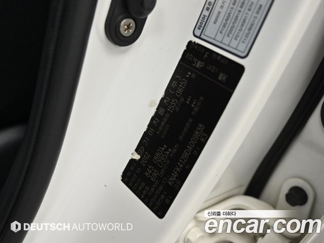 Kia K3 2013 — photo 20
