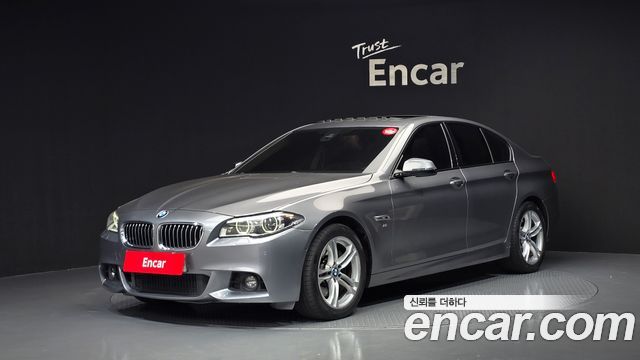 BMW 5-Series 2015 — photo 1