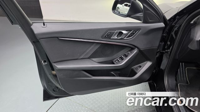 BMW 1-Series 2024 — photo 14