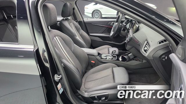 BMW 1-Series 2024 — photo 16