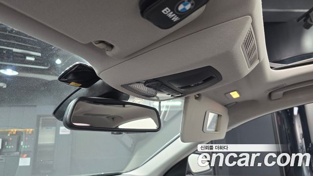 BMW 7-Series 2012 — photo 32