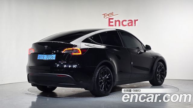 Tesla Model Y 2022 — photo 2