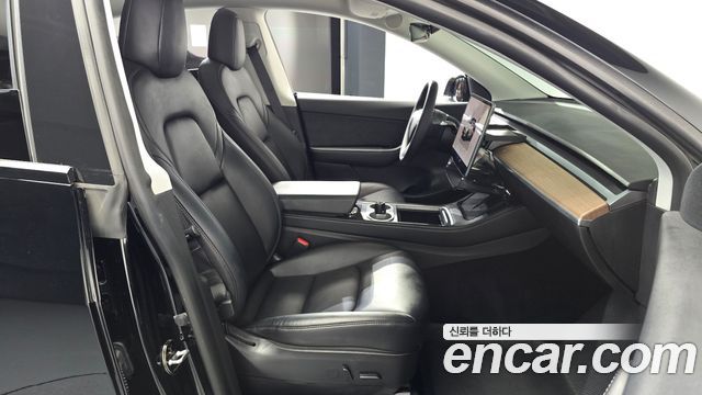 Tesla Model Y 2022 — photo 16