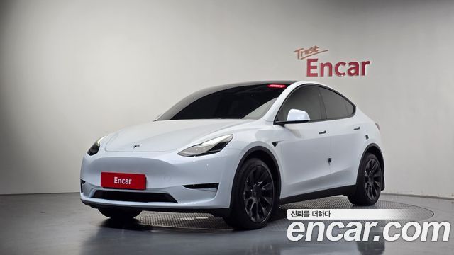 Tesla Model Y 2024 — photo 34