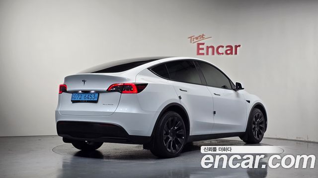 Tesla Model Y 2024 — photo 2