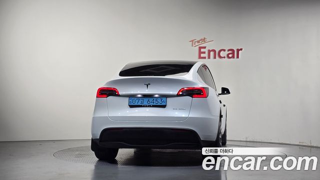 Tesla Model Y 2024 — photo 4