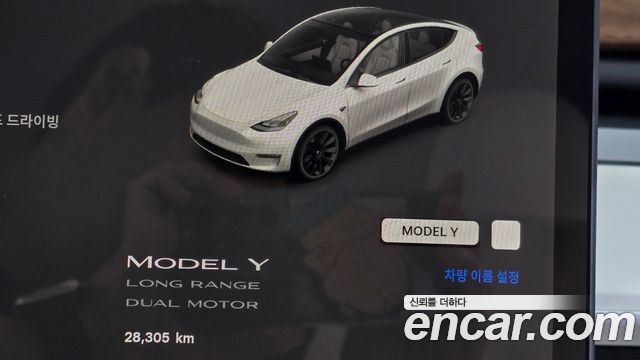 Tesla Model Y 2024 — photo 11