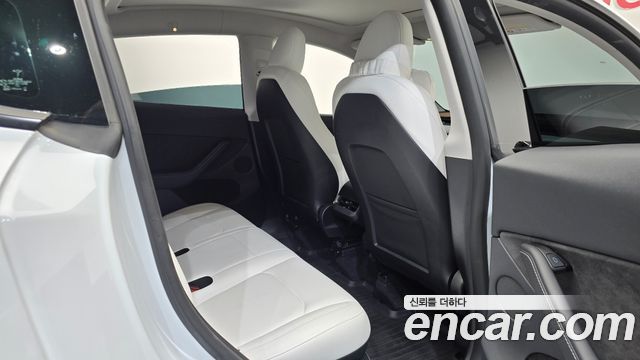 Tesla Model Y 2024 — photo 17