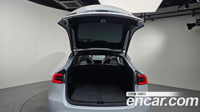 Tesla Model Y 2024 — photo 24