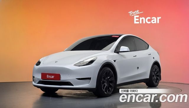 Tesla Model Y 2024 — photo 1
