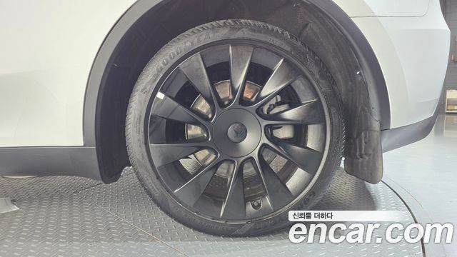 Tesla Model Y 2024 — photo 7