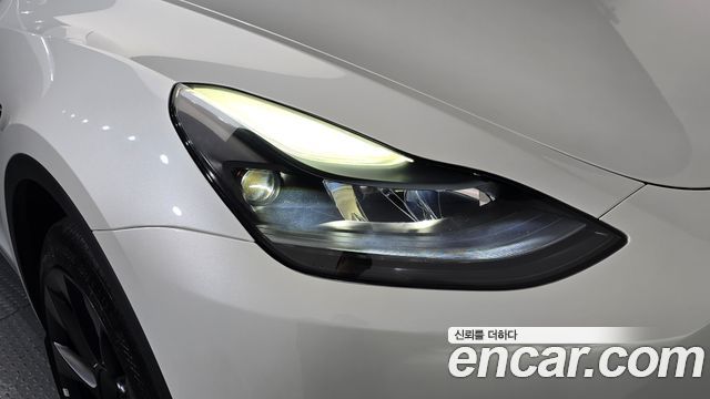Tesla Model Y 2024 — photo 8