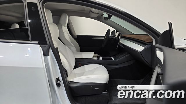 Tesla Model Y 2024 — photo 16