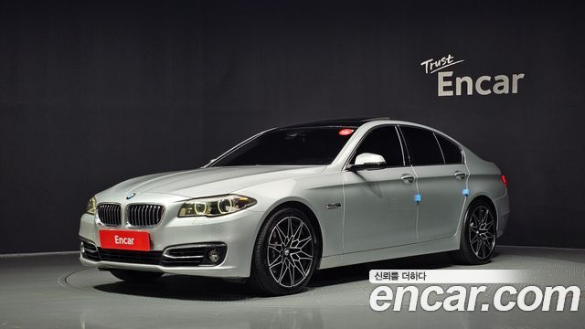 BMW 5-Series 2014 — photo 1