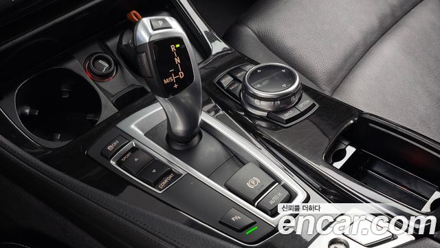 BMW 5-Series 2014 — photo 9