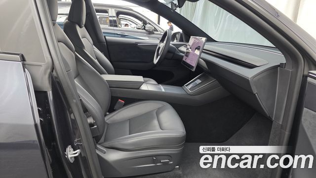Tesla Model Y 2026 — photo 16