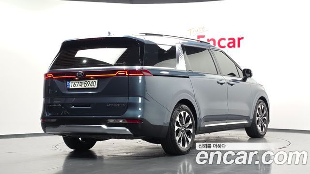 Kia Canival 2021 — photo 2