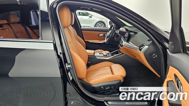 BMW 3-Series 2024 — photo 11