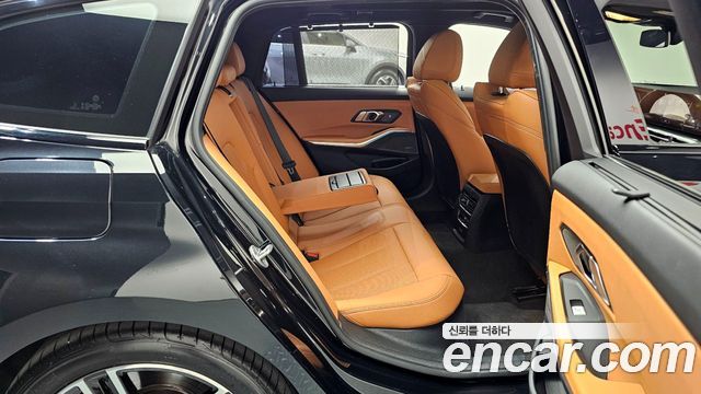 BMW 3-Series 2024 — photo 12