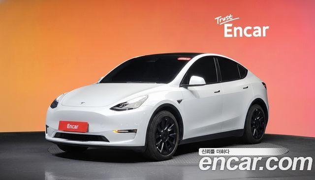 Tesla Model Y 2021 — photo 1