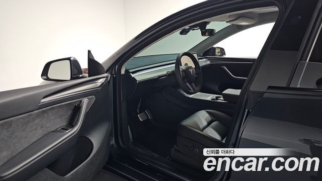 Tesla Model Y 2024 — photo 13