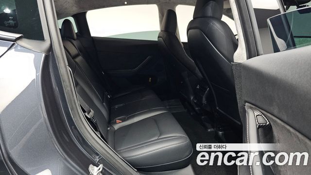 Tesla Model Y 2024 — photo 17